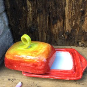 butter dish red yellow